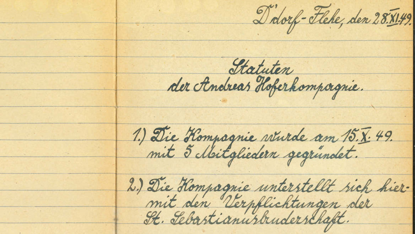 Düsseldorf-Flehe, den 28.XI.1949. Seinerzeit wurden die Statuten der Andreas-Hofer-Kompanie niedergeschrieben. Die grundlegenden Bestimmungen der Vereinssatzung gelten bis heute.